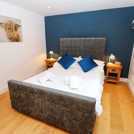 The Warren Barn Casa de Férias